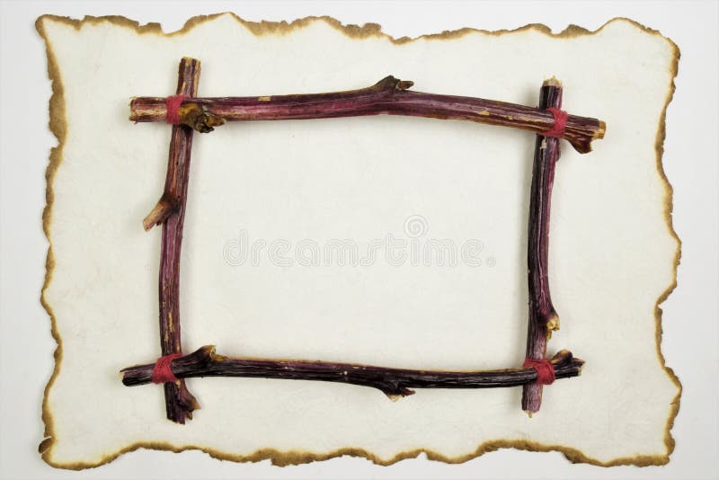 Frame of twigs for design on vintage paper scroll. Vintage art frame to indicate important text, picture, photo, price or sign -. Black Friday sale, Christmas royalty free stock photography