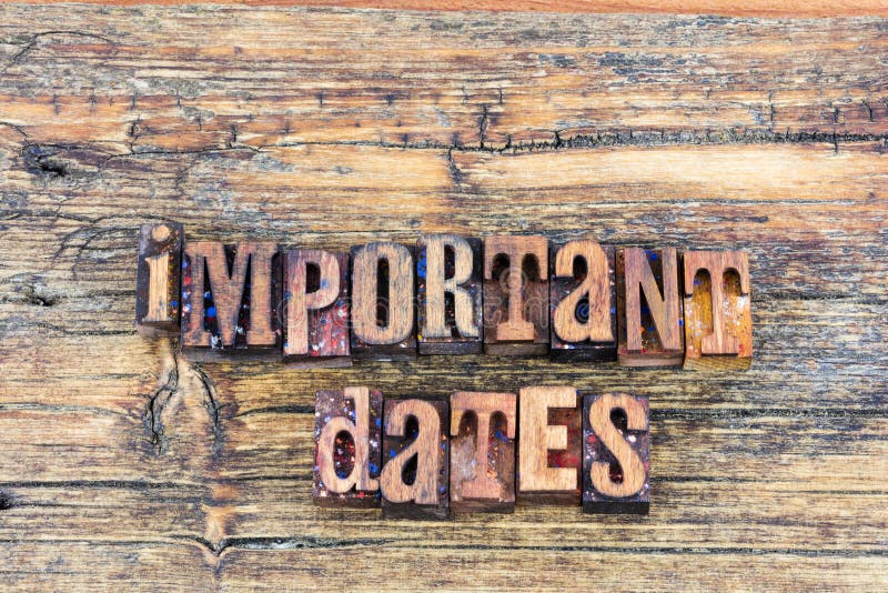 Important dates sign letterpress. Important dates list message sign letterpress barn wood block words background typography calendar schedule stock photo