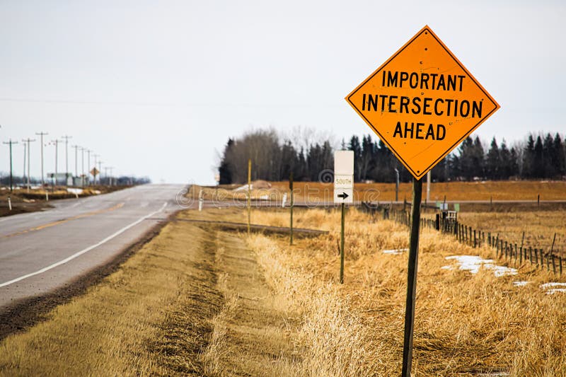 Important intersection ahead sign. At a secondary highway turn off royalty free stock image