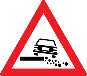 Traffic sign of Romania: Warning for a soft verge