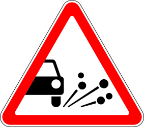 Traffic sign of Russia: Warning for loose chippings on the road surface