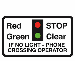 Warning lights at level crossing sign