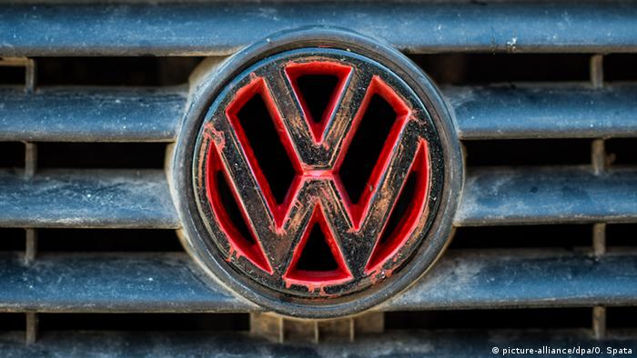 A rusted VW logo